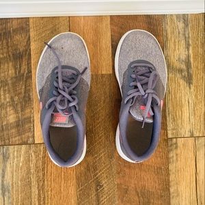 Pink and gray Nike tennis shoes
